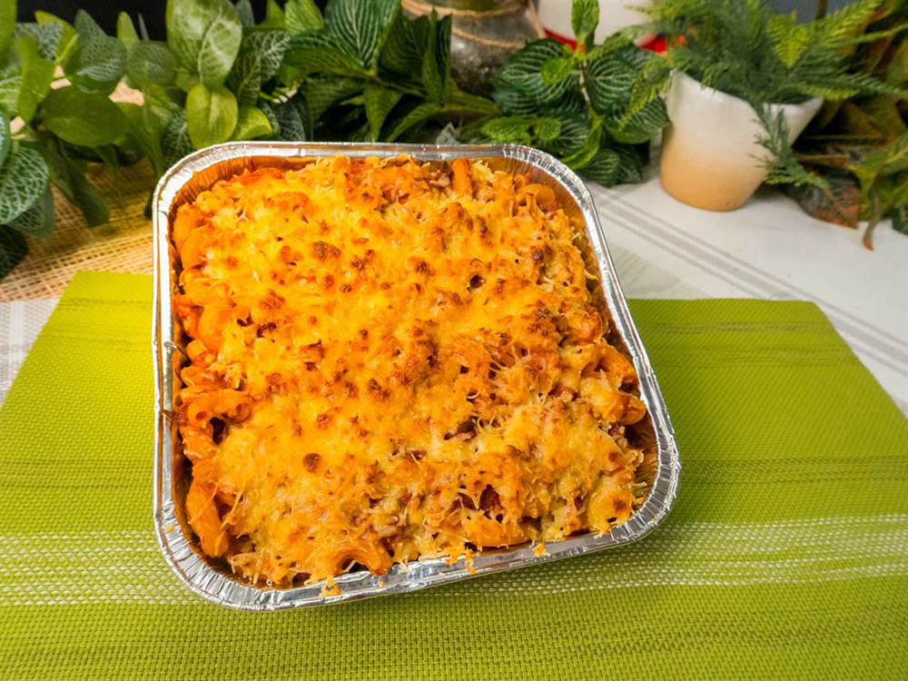 Corned beef baked macaroni finished in a foil catering tray, a menu application for Lucky 7 Carne Norte